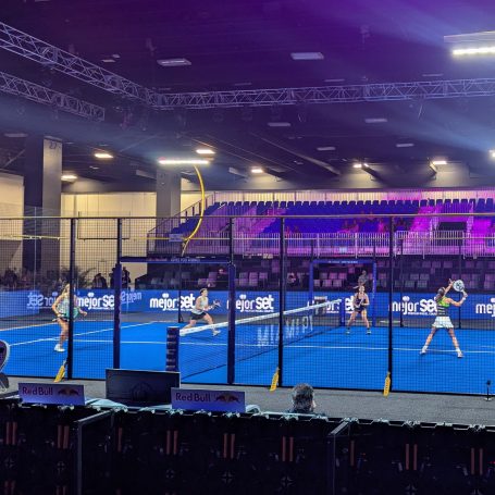 Miami Premier Padel P1 Center Court! Four female padel players contest a point on a spotlit padel court inside a dark arena.